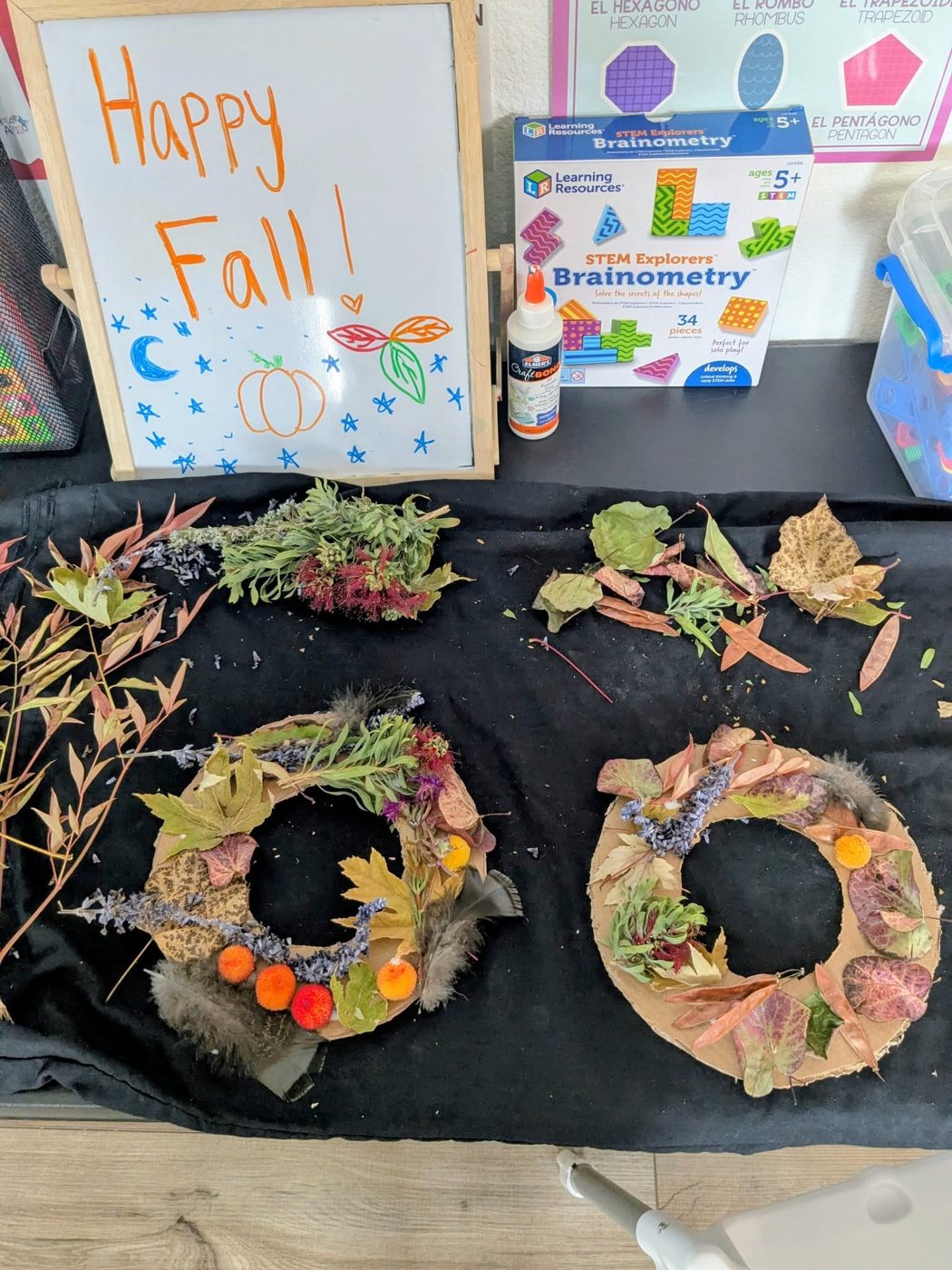 Fall wreaths children made from leaves, feathers and flowers